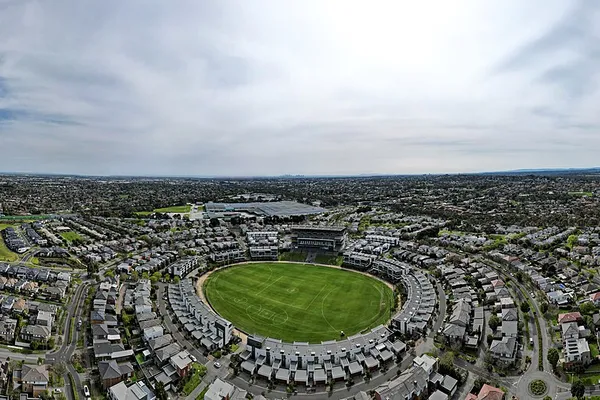 Aerial view of Waverley Park with Melbourne city skyline, Monash region